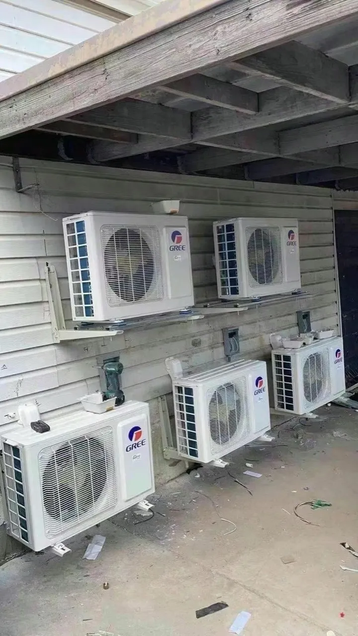 Multiple Gree outdoor condenser units mounted on a Brooklyn building installed by Kings AC Supply